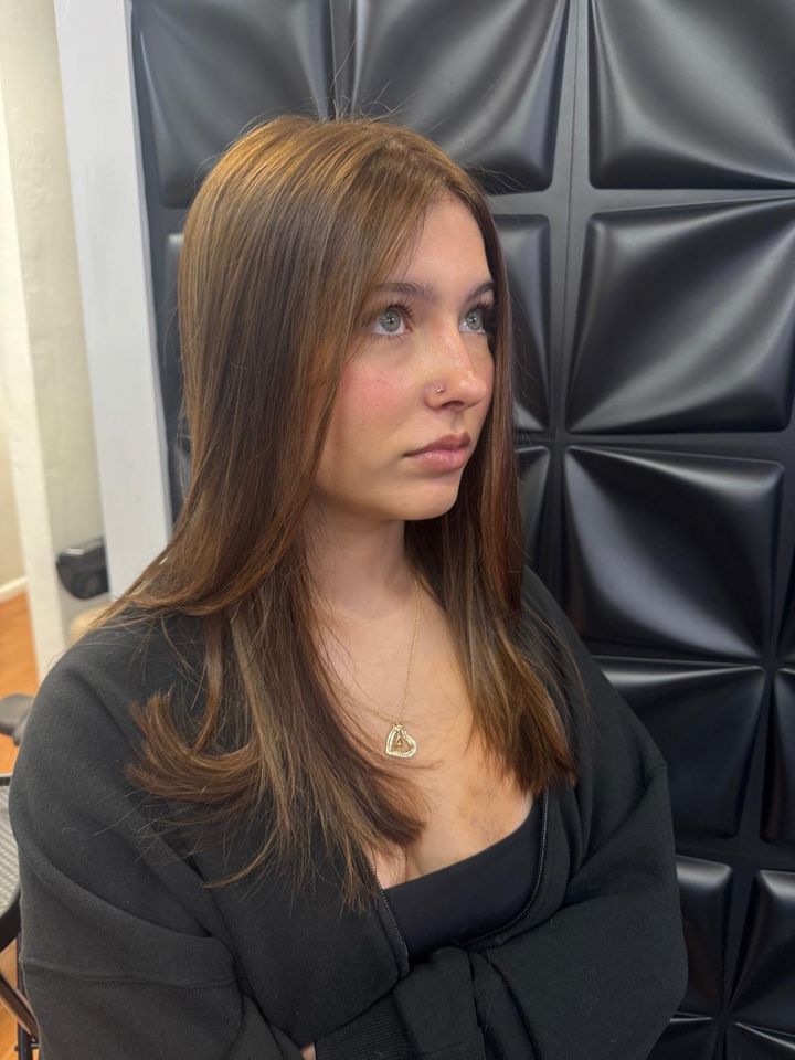 Client with long, soft brunette layers