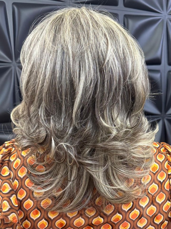 Layered silver hair with soft highlights